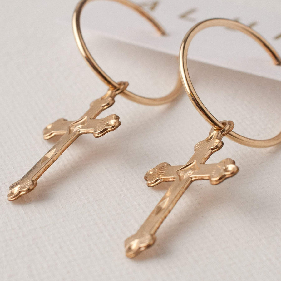 Cross hoop earrings with gold circle hoops 